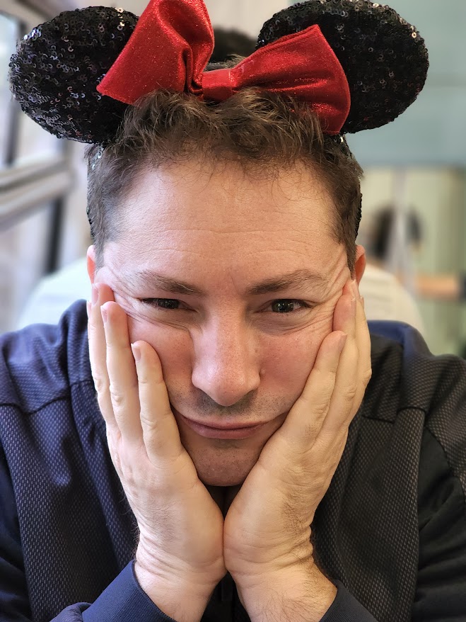 Zvi Chazanov wearing Minnie Mouse ears at Disneyland Paris