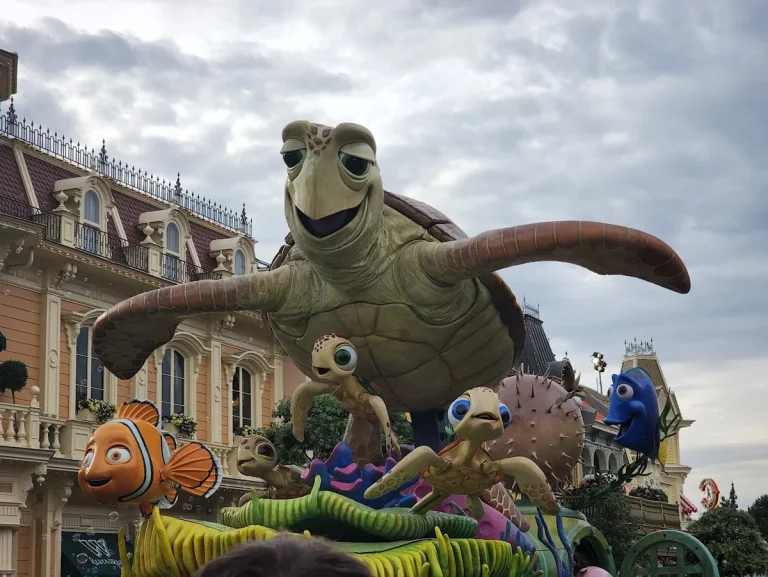 Crush, Nemo and Dory on a float in the character parade on Main Street U.S.A. at Disneyland Paris