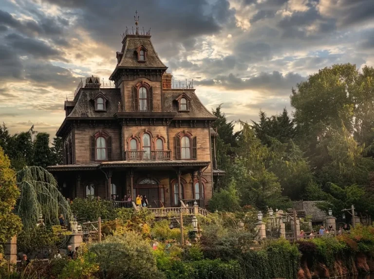 The Phantom Manor mansion in Frontierland at Disneyland Paris under cloudy skies