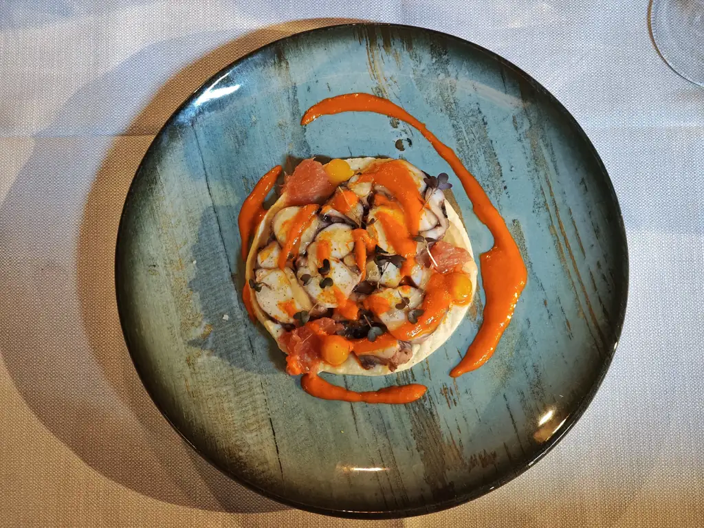 Octopus dish in pepper and grapefruit sauce at Le Sarment restaurant in Auxerre. Photo: Zvi Chazanov